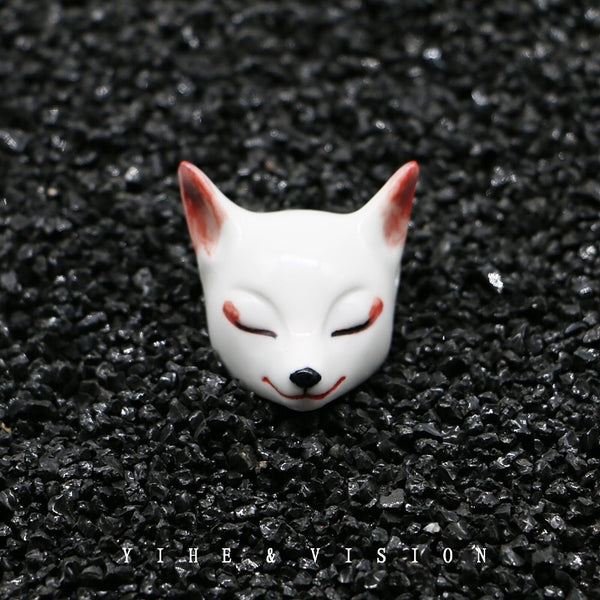 pendentif masque kitsune en céramique