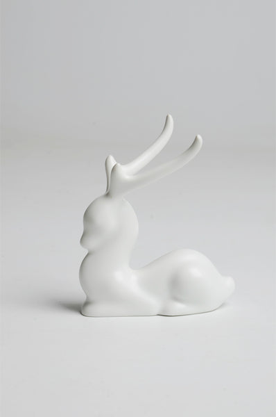 Glazed porcelain deer figurine