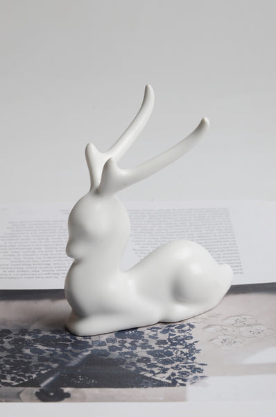Glazed porcelain deer figurine