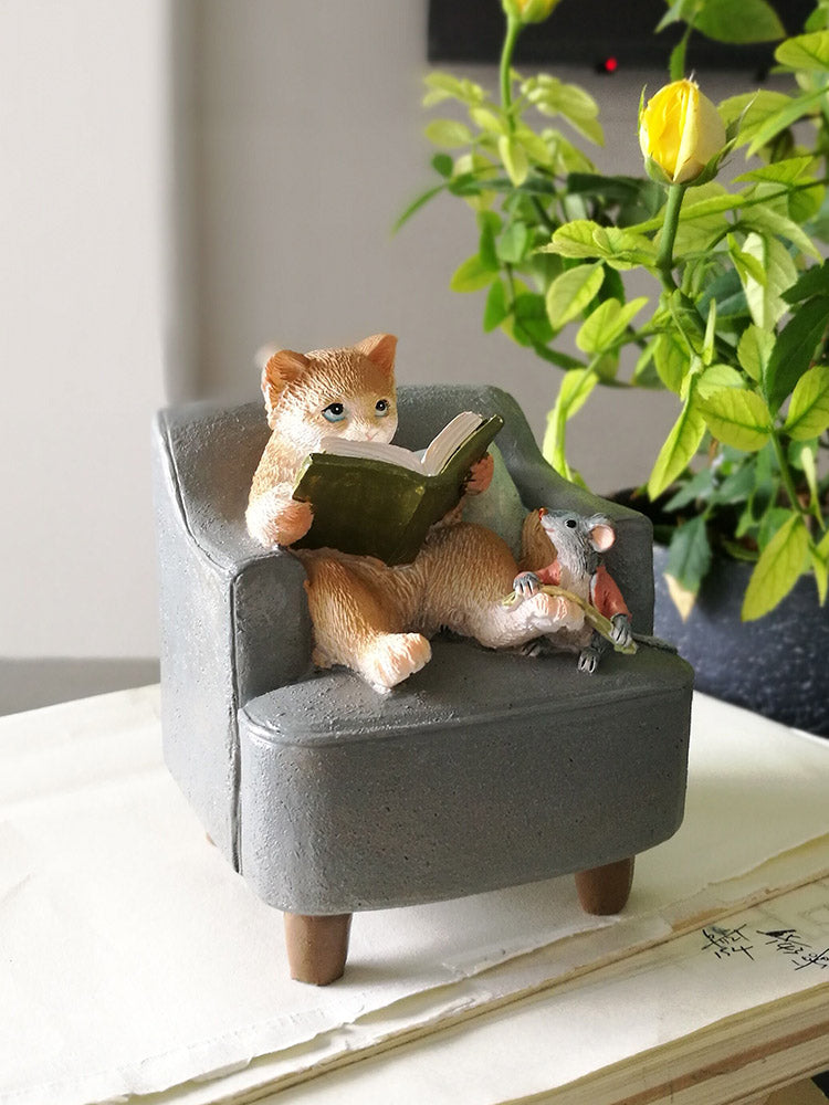 reading cat figure